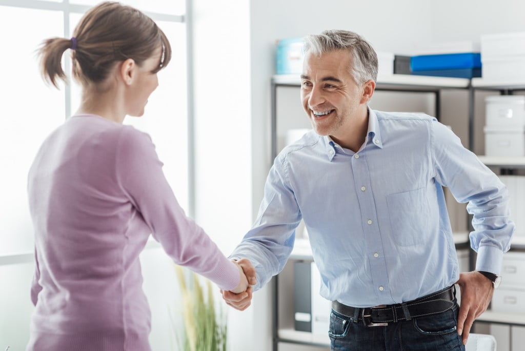 Employer and candidate shaking hands