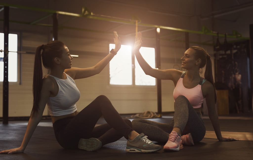 2 woman exercising